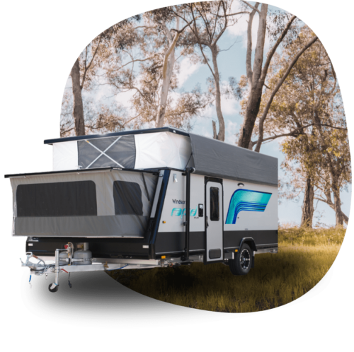 Caravan out in the trees.