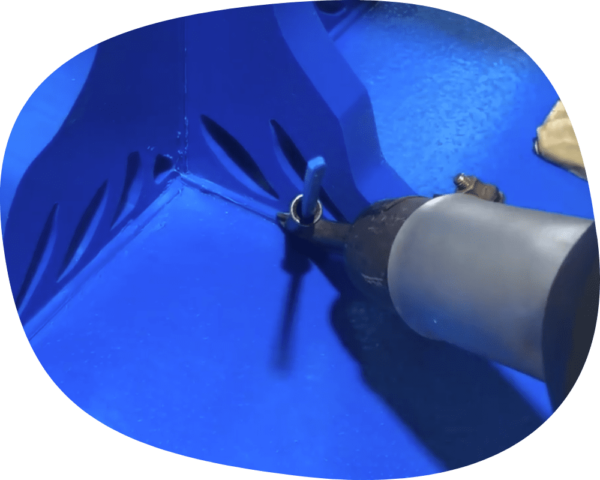 Blue plastic tree sculpture fabrication.