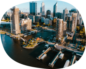 an aerial view of a city with tall buildings.