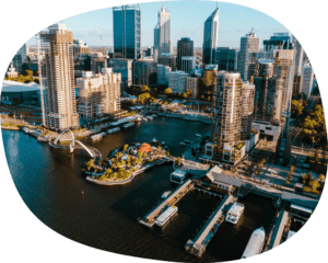 an aerial view of a city with tall buildings.