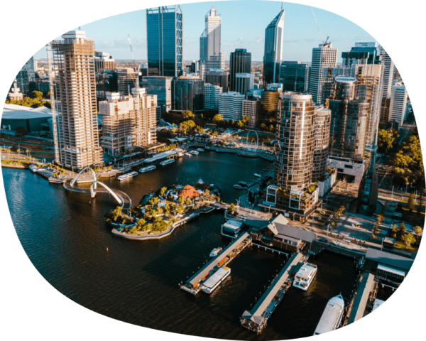 an aerial view of a city with tall buildings.