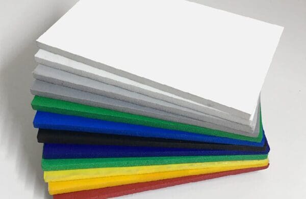 a stack of different coloured plastic sheets.