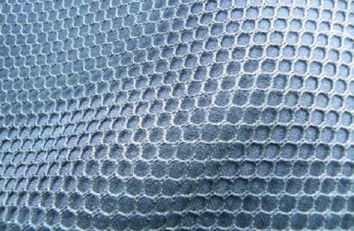 a close up view of a blue fabric.