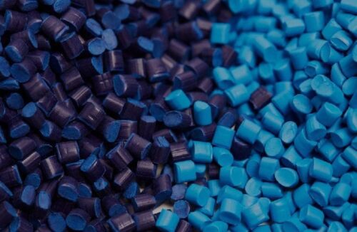 a pile of blue and brown pieces of plastic.